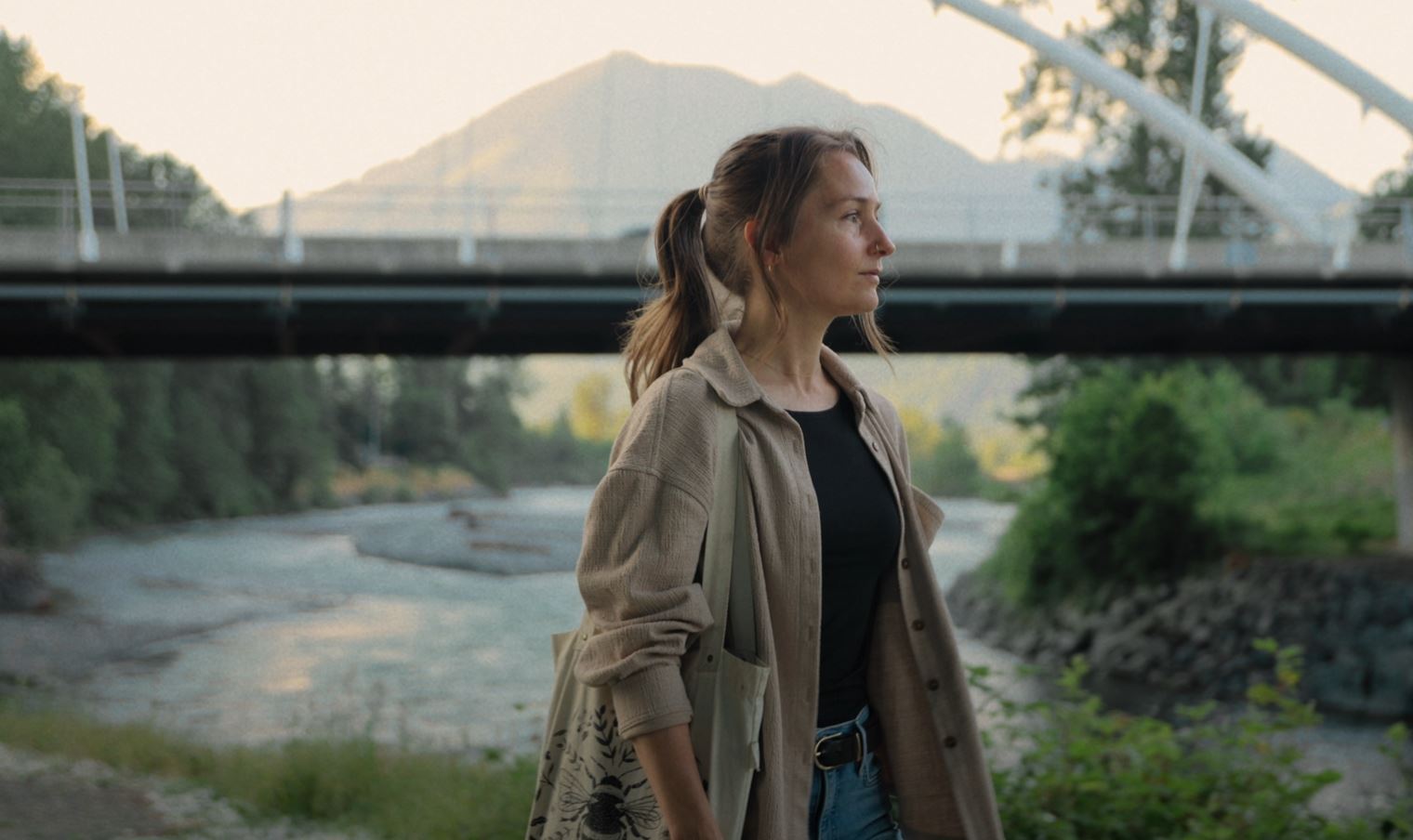 Local resident by the Vedder Bridge with mountain backdrop